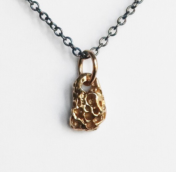 Tiny Gold Shell Fragment Charm Necklace-10k yellow gold and black sterling silver chain.