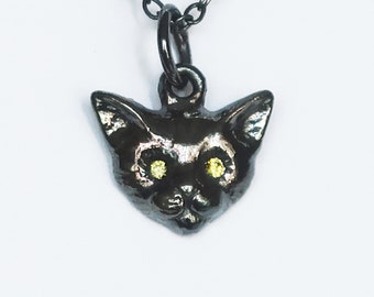 Ready to Ship-Small Black Cat Charm with genuine light yellow sapphire eyes.