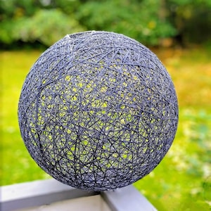 Sustainable style: Handcrafted 60 cm woven yarn pendant lamp - artisan crafted, eco-chic decor.