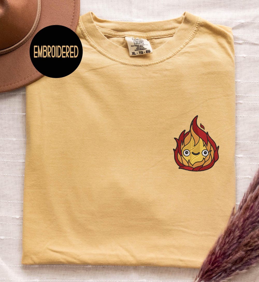 Embroidered Calcifer Shirt, Howl'S Moving Castle, Comfort Colors Pocket Embroidered Tee, Calcifer Shirt, Anime Shirt, Studio Ghibli Apparel Tztshirt 2025 Topic