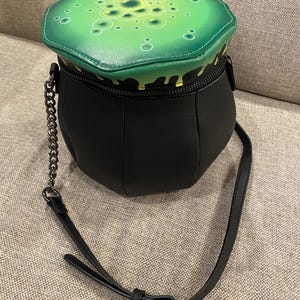 Zwarte en groene schoudertas Mad engine Cauldron NIEUW viral