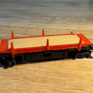 Vintage Tyco HO Operating Log Dump Flat Car- No logs- Very Good Condition