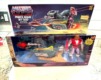 Masters of the Universe Prinz Adam & Sky Sled Actionfigur NIB