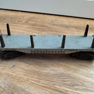 Vintage Lionel No. 6411 Flatcar- Lionel Lumber Flatcar- No Load and Good Condition