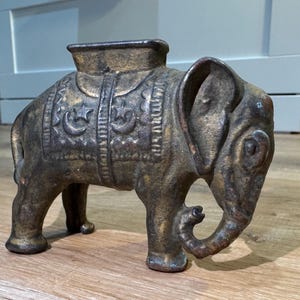 Antique A.C. Williams Circus Elephant Piggy Bank, circa 1910s-1930s- Elephant with Houdah Cast Iron Bank- Good Condition