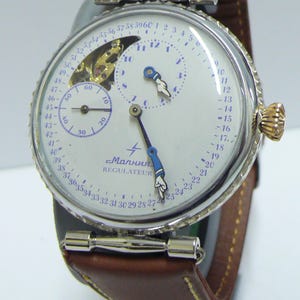 Orologio da polso da uomo sovietico MOLNIJA MOLNIA Regulatteur (Regolatore) degli anni '70. *SERVITATO*