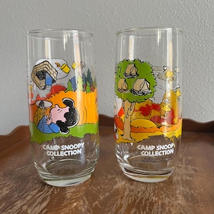 A Pair of Vintage Camp Snoopy Collection Glass Tumblers by McDonalds, Two Scenes