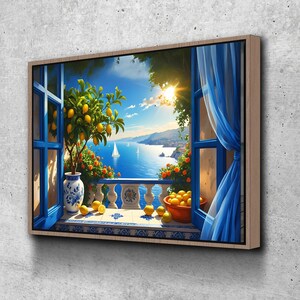 Peut inclure: Impression sur toile encadr&eacute;e d'une sc&egrave;ne c&ocirc;ti&egrave;re. Une fen&ecirc;tre bleue encadre un balcon avec un citronnier dans un vase d&eacute;coratif. Citrons et fleurs oranges, mer bleu vif et voiliers au loin.