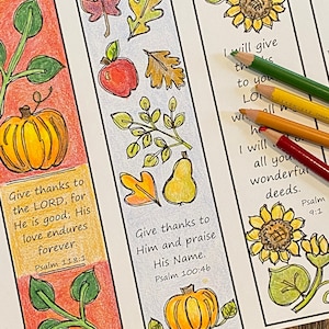 May include: Three printable bookmarks with fall-themed illustrations and Bible verses. The bookmarks feature pumpkins, leaves, apples, and sunflowers. The verses are Psalm 118:1, Psalm 100:46, and Psalm 9:1.