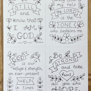 May include: Four black and white printable cards with inspirational quotes and bible verses. The cards feature hand-drawn floral designs and the text "Be Still and know that I am God", "Surely God is my help the Lord is the One who sustains me", "God is our refuge & strength, an ever-present help in times of trouble", and "Be Strong and take heart all you who hope in the Lord".