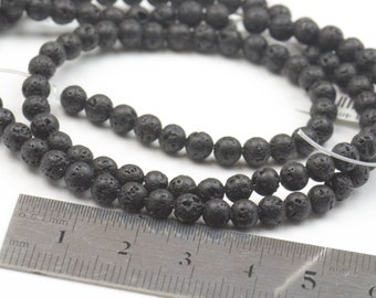 Lava strand of round beads.23 inches strand . 60 cm. 4mm beads