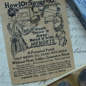 One Antique Mendets Repair Kit with Gorgeous Ephemera unused complete in original slider box
