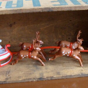 Christmas Kitsch Santa Sleigh and Reindeers