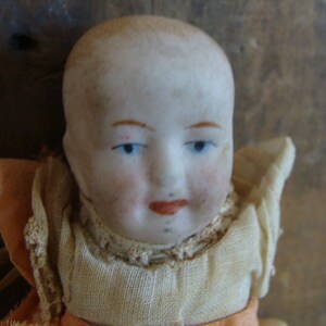 Antique Jointed Bisque Hand painted Doll Head Torso
