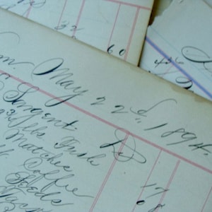 May include: Close-up of a handwritten document with the date May 22, 1894. The text includes the names Tom & Sangent and mentions 3 lbs of juice and matches.
