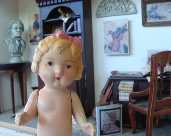 Antique Jointed Bisque Doll with Bow and Darling Boots