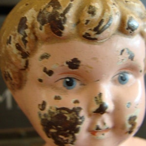 One Antique German Tin Metal Doll Head