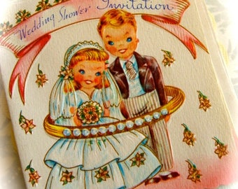 May include: Vintage wedding shower invitation featuring a cartoon bride and groom. The invitation has a scalloped edge and a banner that reads "Wedding Shower Invitation". The bride is wearing a white dress and veil, and the groom is in a suit.