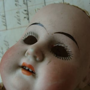 Discounted Antique German Doll Jointed Kid Leather Body with broken shoulder plate