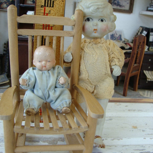 One Very Small Rare Antique Fully Jointed Bisque Baby Doll with Little blue Sleeper on