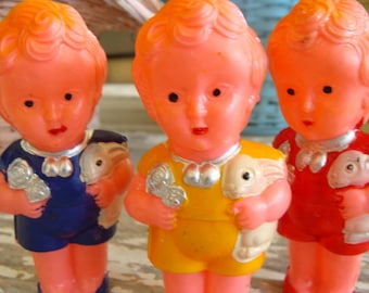 One Adorable Vintage Celluloid Kitsch Rattle  Doll and Bunny Great for Vintage Easter Decor New Old Stock Never Used