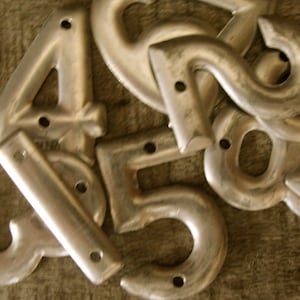 Dozen Vintage Metal Steampunk Bell System Aluminum Numbers Lot