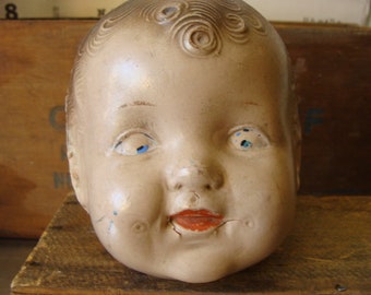 Large Antique Chilling Creepy Grin Haunting Composition Aged and Damaged Doll Head