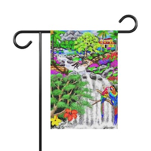 May include: A garden flag featuring a vibrant tropical scene. The artwork depicts a waterfall, lush greenery, colorful flowers, and a pair of parrots perched on a branch. The flag is mounted on a black metal stand.