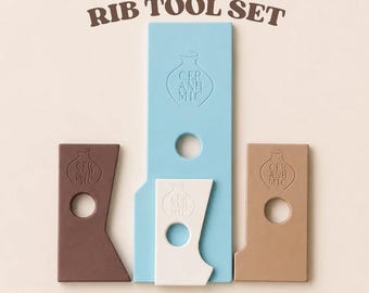 May include: A rib tool set consisting of four flat pottery tools in light blue, white, dark brown, and tan. Each tool features a circular hole and a debossed vase-shaped logo with the text CER ANH MIC. Text reads RIB TOOL SET and loved by thousands of potters worldwide!