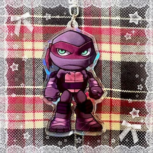 May include: A set of three ceramic mugs with a speckled, matte finish. The mugs are in shades of cream, light gray, and dark gray. Each mug has a simple, minimalist design, perfect for coffee or tea.