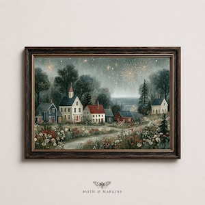 May include: A framed landscape art print depicting a small village with houses, trees, and a field of wildflowers under a night sky filled with golden fireworks. The text MOTH & MARGINS is printed in black at the bottom centre of the frame.