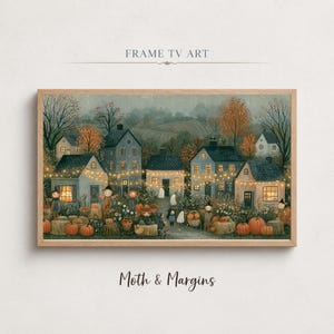May include: A digital art print depicting a whimsical autumn village scene with houses illuminated by string lights, surrounded by orange pumpkins, hay bales, and small figures in costumes. The landscape features muted blue and brown tones.