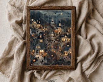 May include: A framed rectangular wall art print featuring a dark, atmospheric village scene at night with glowing orange pumpkins, illuminated houses, bare trees, and silhouettes of birds against a moonlit sky. The text MOTH & MARGINS is visible.