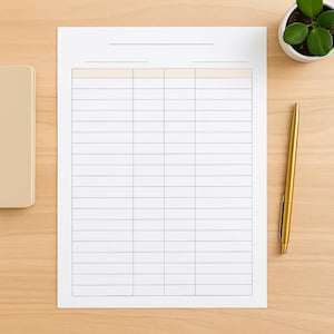 May include: A blank white paper with a grid of boxes, a gold pen, a small potted plant, and a beige notebook on a light wood surface. The paper has a light peach-coloured header.