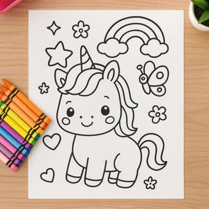 May include: A coloring page featuring a cartoon unicorn with a rainbow, stars, flowers, and a butterfly. A set of colorful crayons is visible on the left. The unicorn has a horn, flowing mane, and a smiling face. The image is on a white paper.