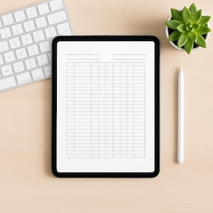 May include: A black tablet displaying a blank spreadsheet, a white stylus, a keyboard, and a small succulent plant in a white pot are arranged on a light wood surface. The tablet is centered, with the other items around it.