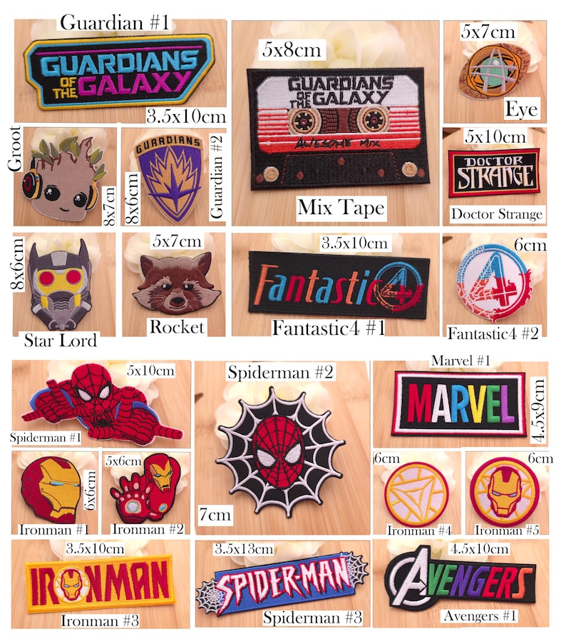May include: A collection of embroidered fabric patches featuring various Marvel characters and logos, including Guardians of the Galaxy, Doctor Strange, Fantastic 4, Spiderman, Ironman, and Avengers, with visible dimensions in centimeters.