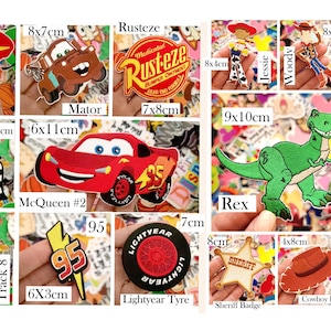 May include: A collection of embroidered patches featuring characters and symbols from the Cars and Toy Story movies, including Lightning McQueen, Mater, Buzz Lightyear, Rex, and Woody, with printed dimensions in centimeters ranging from 1x8cm to 10x7cm.