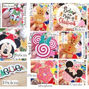 May include: A collection of various character-themed felt or fabric patches and ornaments, including Santa Donald, Stitch, Daisy, Mickey, Minnie, gingerbread figures, a Believe sign, pretzel, ice cream, and cupcake designs with visible dimensions in cm.