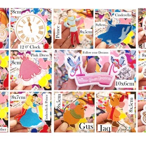 May include: A collection of colorful iron-on patches featuring various designs from the Cinderella fairytale. Includes a blue carriage, a clock, a prince, Cinderella, a quote, birds, a pink dress, and characters like Gus and Jaq. Sizes vary, with the largest being 10x6cm.