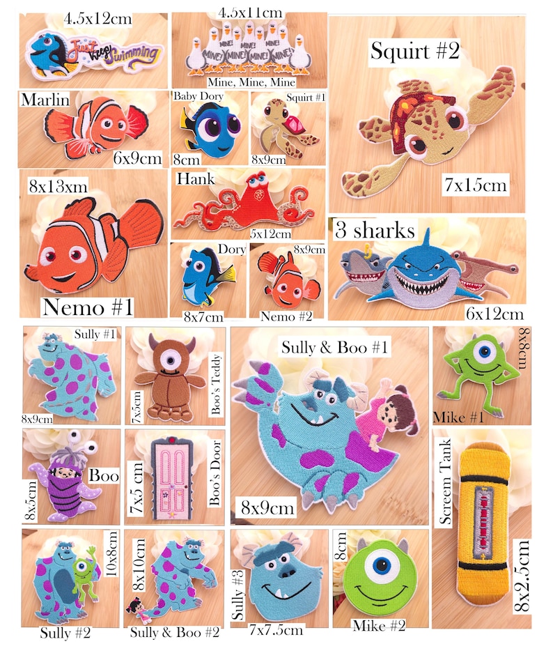 May include: A collection of embroidered fabric patches featuring various animated characters from Finding Nemo and Monsters Inc. Each patch displays specific dimensions in inches or centimeters, including characters like Dory, Nemo, Squirt, Marlin, Hank, Sully, Boo, and Mike, alongside themed items like a door and a tank.