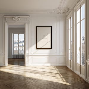 Puede incluir: Vista interior de una habitación con paredes blancas, suelo de madera y grandes ventanas. Una impresión artística enmarcada con el texto "ART PRINT TEMPLATE" cuelga de la pared. La habitación tiene molduras y detalles arquitectónicos.