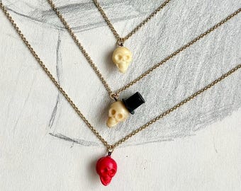 1930s Skull Cracker Jack Charm Necklaces