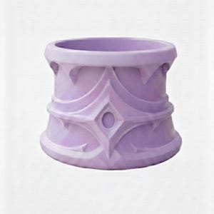 May include: A lavender-colored decorative planter with an ornate design. The planter has a cylindrical shape with a wide opening and a detailed pattern of diamond and curved shapes. The design is repeated around the circumference of the planter.