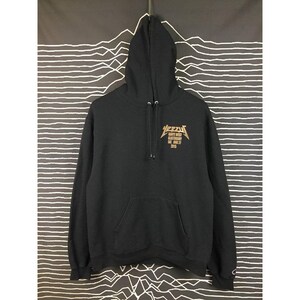 May include: Black hoodie with a front kangaroo pocket and drawstring hood. The gold text on the front reads "Yeezy" above "Kanye West Glastonbury" and "Sat. June 27 2015". The hoodie is made of a soft material.