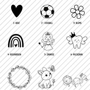 May include: Black and white illustrations of various designs, including a heart, soccer ball, flower, rainbow, fairy, tooth with wings, floral wreath, bunny with butterfly, and zoo animals. The text "MOTIVE MILCHZAHNDOSEN" is at the top.