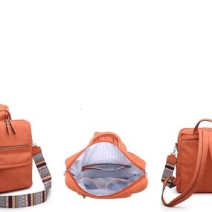 May include: A brown faux leather backpack with a zippered front pocket and a patterned strap. The backpack is shown from three angles: front, inside, and back.