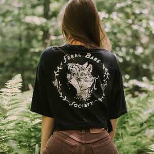 Feral Babe Society® - Vintaged Crop Tee, womens crop t-shirt, Floral tattoo style, Wolf and girl, rockabilly style, punk style by Simka Sol®