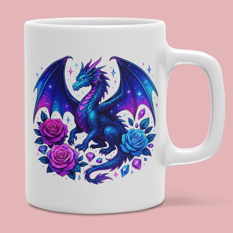 May include: A white ceramic mug featuring a colorful graphic of a blue and purple dragon with large wings. The dragon is surrounded by two purple roses, one blue rose, and several small geometric crystal shapes against a white background.
