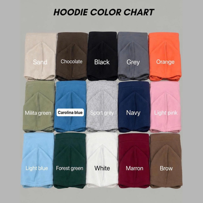 May include: A hoodie color chart featuring fifteen folded fabric squares in various colors labeled Sand, Chocolate, Black, Grey, Orange, Military green, Carolina blue, Sport grey, Navy, Light pink, Light blue, Forest green, White, Marron, and Brown.